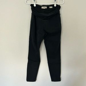 Madewell black maternity skinny jeans with over belly panel.